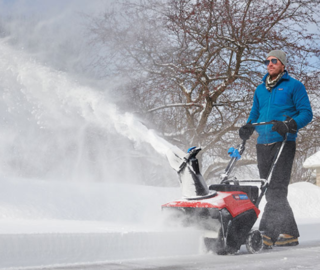 removing snow by using toro snowblower